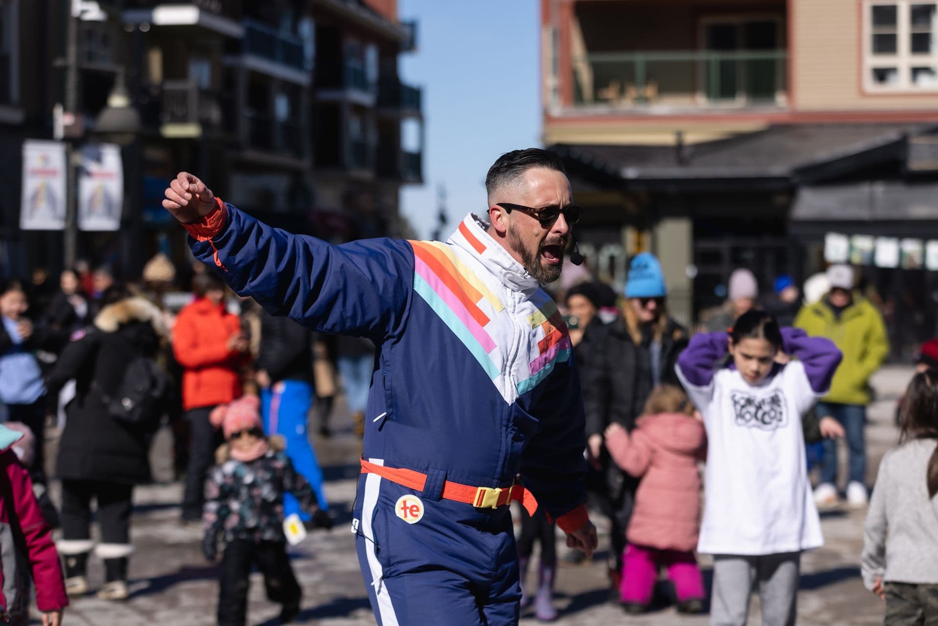 Legendary local, Tyler Boyle, leads groove dancing in the Village Events Plaza.
