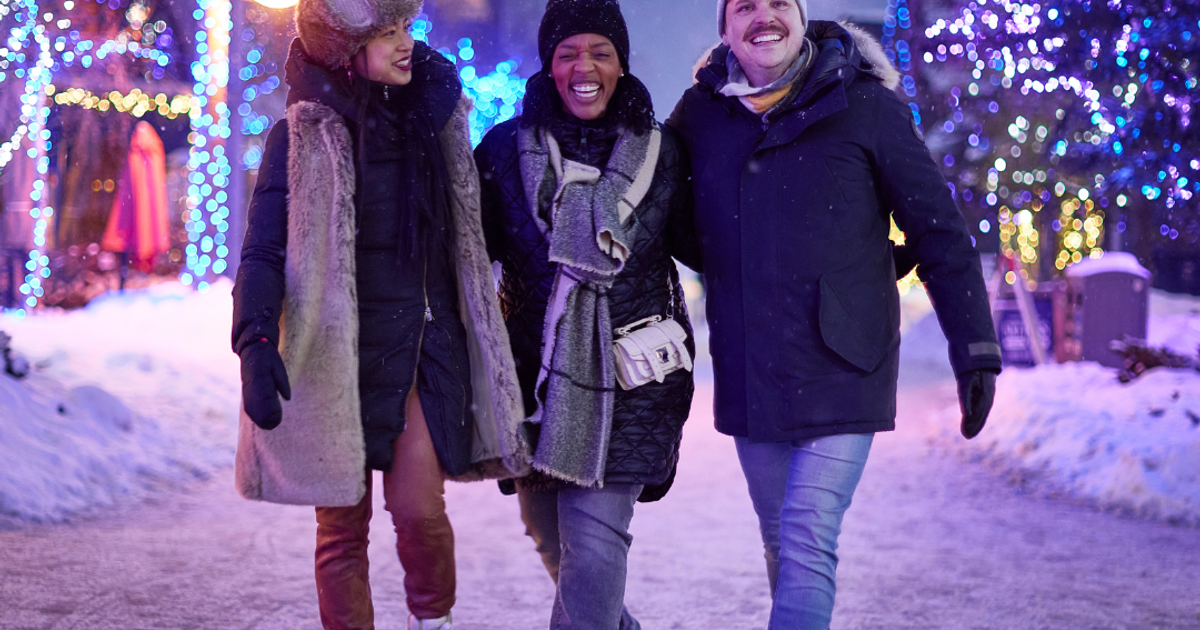 Friends walking around Blue at Night